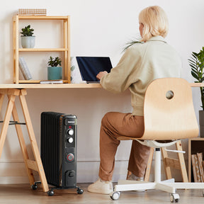 Radiateur à huile compact de 2 500 W avec 11 ailettes et contrôle du thermostat