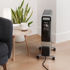 <tc>OmniWarm Radiatore a Olio 2500W con 11 Lamelle, Modalità Eco, Display Digitale e Controllo tramite App - Nero</tc>